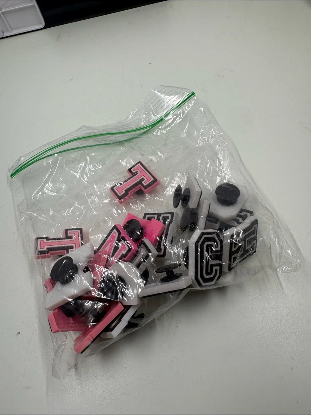 Croc pendants different letters black white pink